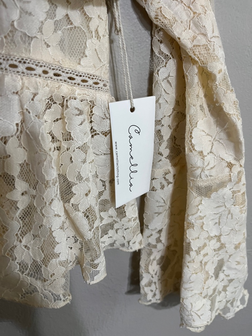 Lace Peplum Button-Front Blouse in Cream - Picture 7 of 10